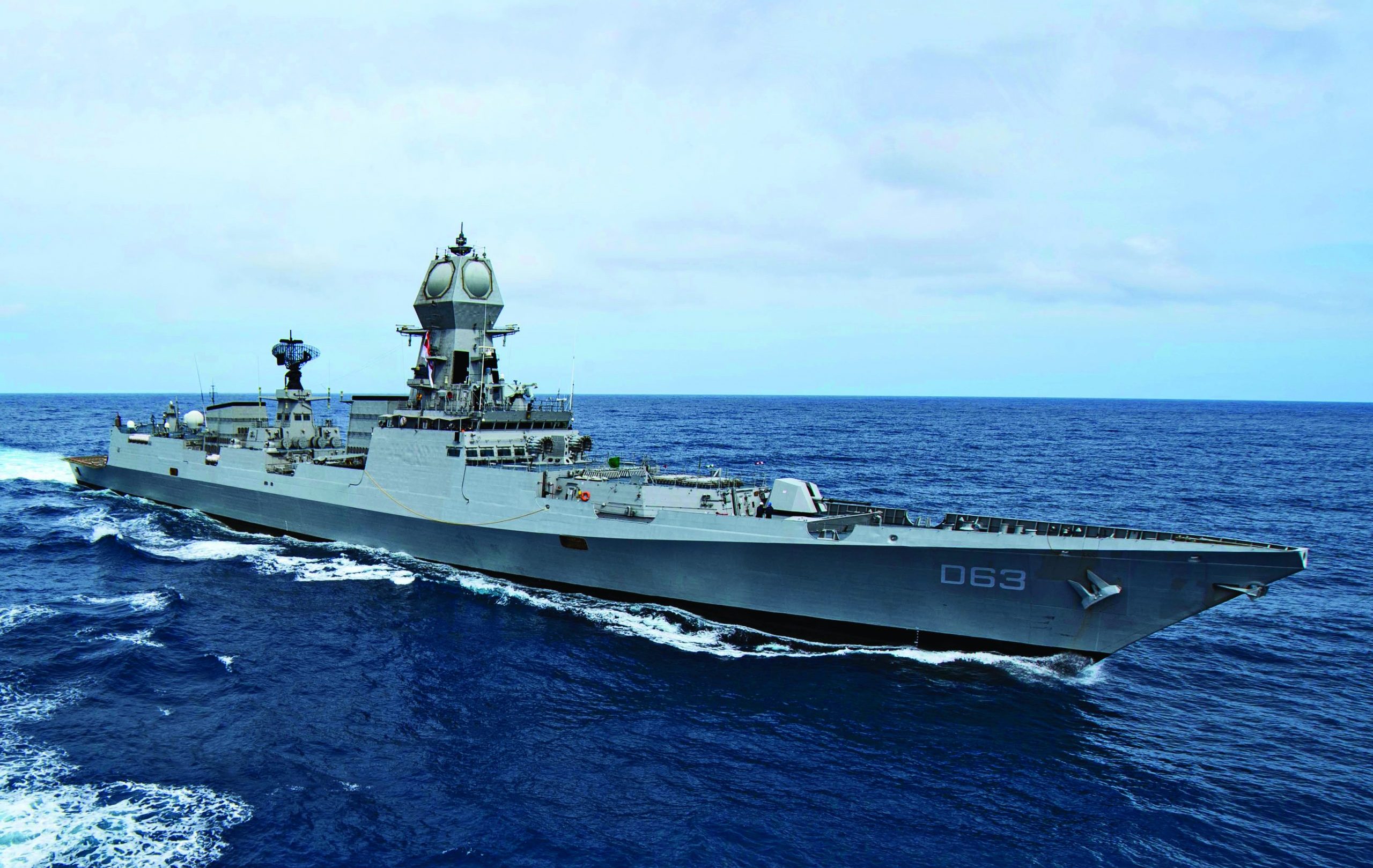 INDIAN OCEAN (Nov. 18, 2020) The Indian navy destroyer INS Kolkata steams alongside the guided-missile destroyer USS Sterett (DDG 104) during Malabar 2020. Malabar 2020 is the latest in a continuing series of exercises that has grown in scope and complexity over the years to address the variety of shared threats to maritime security in the Indo-Pacific where the U.S. Navy has patrolled for more than 70 years promoting regional peace and security. Nimitz Carrier Strike Group is currently deployed to the 7th Fleet area of operations in support of a free and open Indo-Pacific. (U.S. Navy photo by Mass Communication Specialist Seaman Drace Wilson)