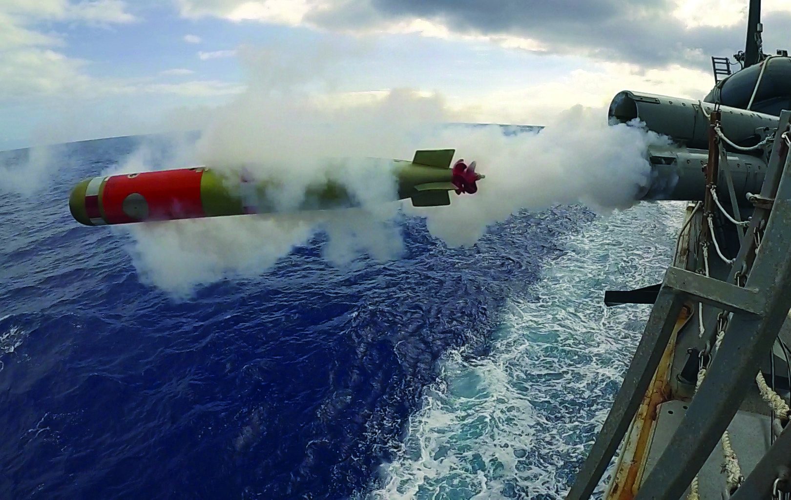 190312-N-WK982-2001 PHILIPPINE SEA (March 12, 2019) A mark 46 shallow water exercise torpedo is fired from the weather deck of the Arleigh Burke-class guided-missile destroyer USS McCampbell (DDG 85) while operating in the Philippine Sea during a live-fire exercise. U.S. Navy warships train together to increase the tactical proficiency, lethality, and interoperability of participating units in an Era of Great Power Competition. (U.S. Navy photo by Mass Communication Specialist 2nd Class John Harris/Released)