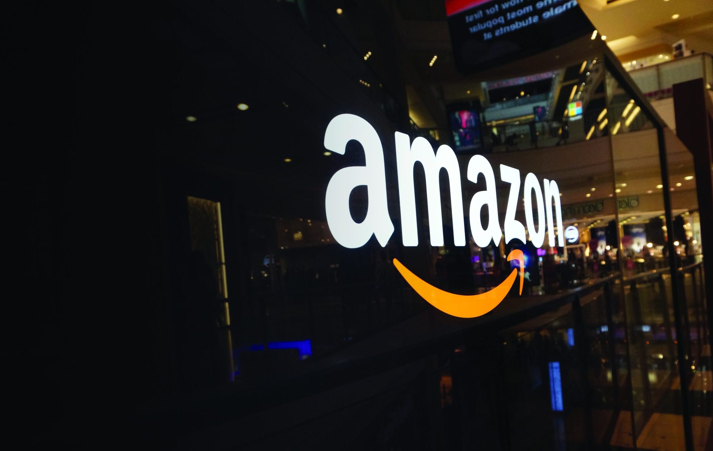 SAN FRANCISCO - OCTOBER 11:  Amazon logo on black shiny wall in mall California October 11, 2015.  Amazon is a American international electronic commerce company and world's largest online retailer.