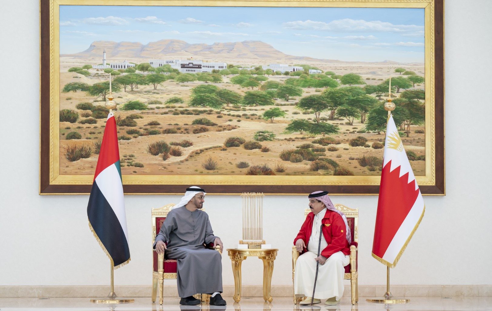 SAKHIR, BAHRAIN - November 10, 2022: HH Sheikh Mohamed bin Zayed Al Nahyan, President of the United Arab Emirates (L), meets with HM King Hamad bin Isa Al Khalifa, King of Bahrain (R), upon arriving at Sakhir Air Base.
( Abdulla Al Neyadi / UAE Presidential Court )
---