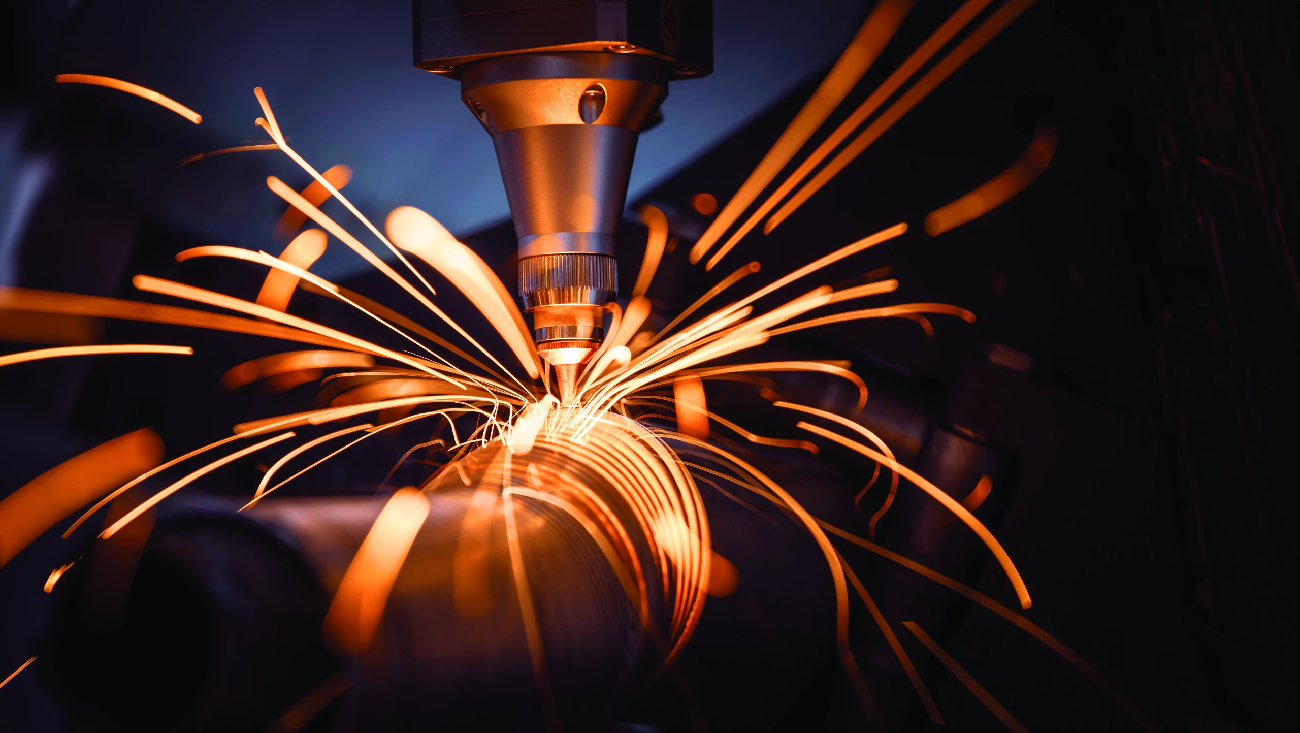 CNC Laser cutting of metal, modern industrial technology Making Industrial Details. The laser optics and CNC (computer numerical control) are used to direct the material or the laser beam generated.