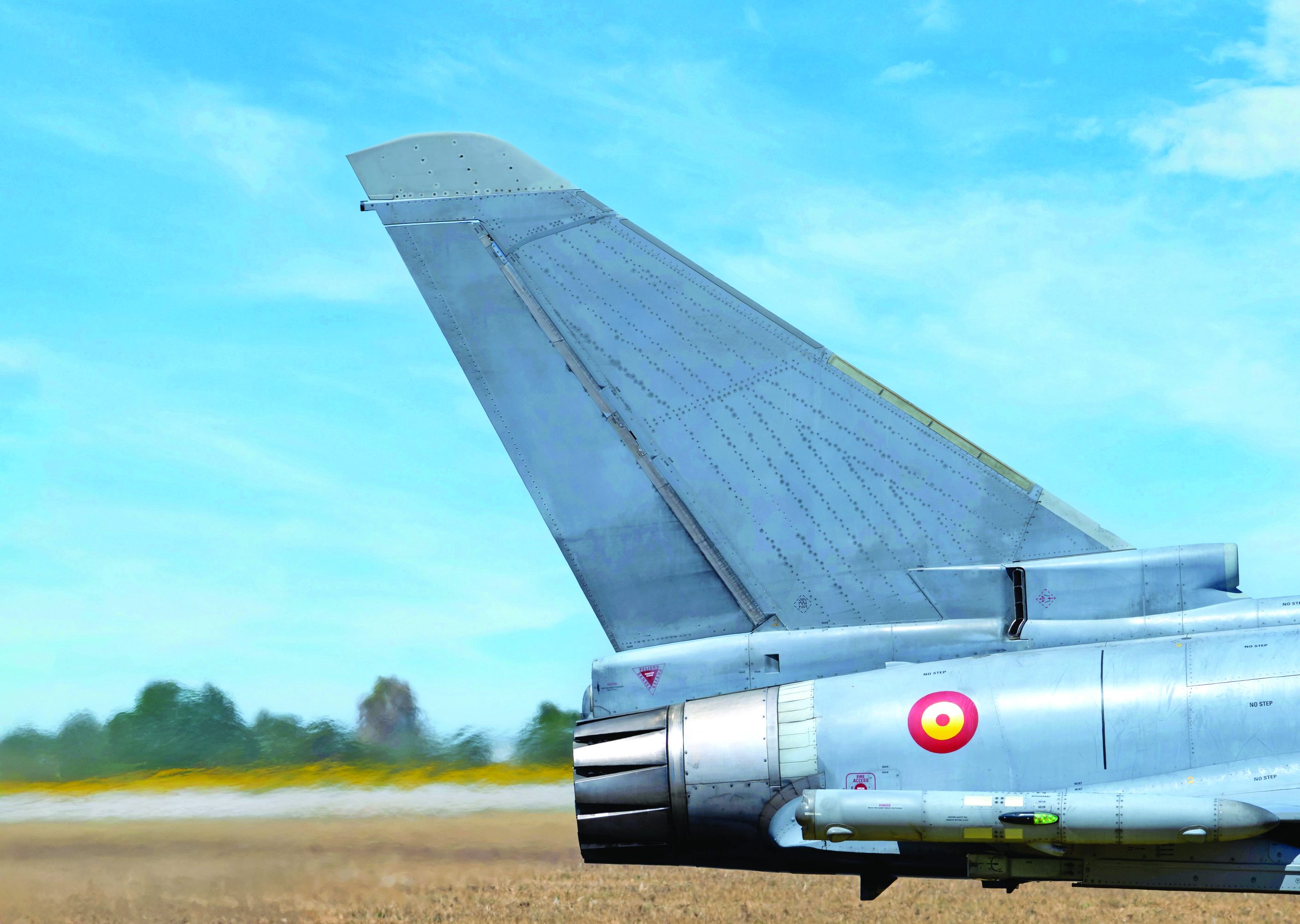 Moron, Spain - 12 May 23: Close-up of a Spanish Air Force Eurofighter aircraft tail with insignia and engine detail