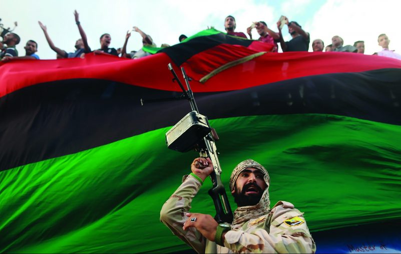 One of the members of the military protecting a demonstration against candidates for a national unity government proposed by U.N. envoy for Libya Bernardino Leon, is pictured in Benghazi, Libya October 23, 2015. REUTERS/Esam Omran Al-Fetori      TPX IMAGES OF THE DAY      - GF20000029968