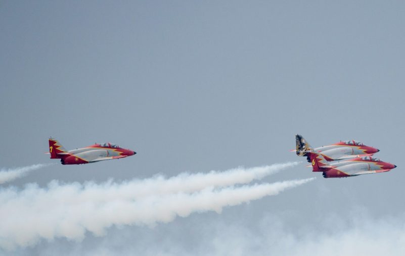 The Spanish patrol CASA C-101 aircrafts perform during an air show marking the French Air Forces 80th anniversary, on the military base of Cazaux, western France, on June 21, 2014. AFP PHOTO / FRED DUFOUR        (Photo credit should read FRED DUFOUR/AFP via Getty Images)